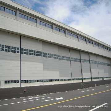 Flexible hangar door in parking lot